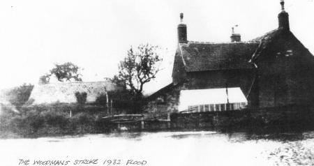 The Woodman's Stroke surrounded by flood water in 1932