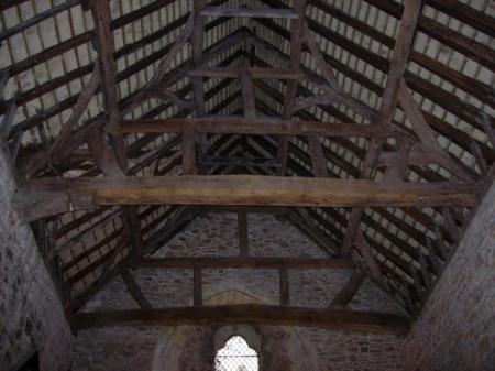 The Chapel roof timbers

The roof timbers date from the 15th century and possibly contain some dating back to the 13th century. The roof is divided into 4 bays and the earlier roof would have had a much steeper pitch.