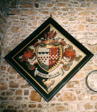 When a notable person died their armour would be displayed on their tomb or hung on the Church walls but when this was no longer done his Coat of Arms with those of his widow were painted on canvas, framed and hung on point.
There are three Hatchments hung in the Chapel:
Thomas Babington who died in 1837 on the black background survived by his wife Jean Macaulay who died in 1845 shown by the white background. They are both buried in the East End of the Chapel.
Motto: RESURGAM