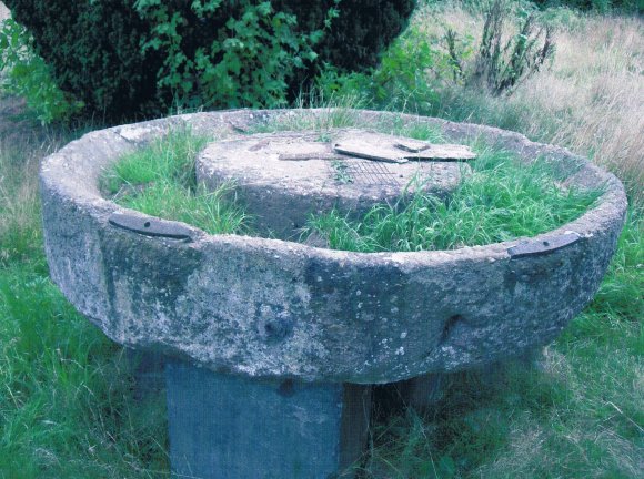 In 2006 an attempt was made to steal the cider press but the metal handle was pulled out due to its weight. This happened at the time the mill wheel was stolen when the burial ground was excavated in 2006. Photo August 2006